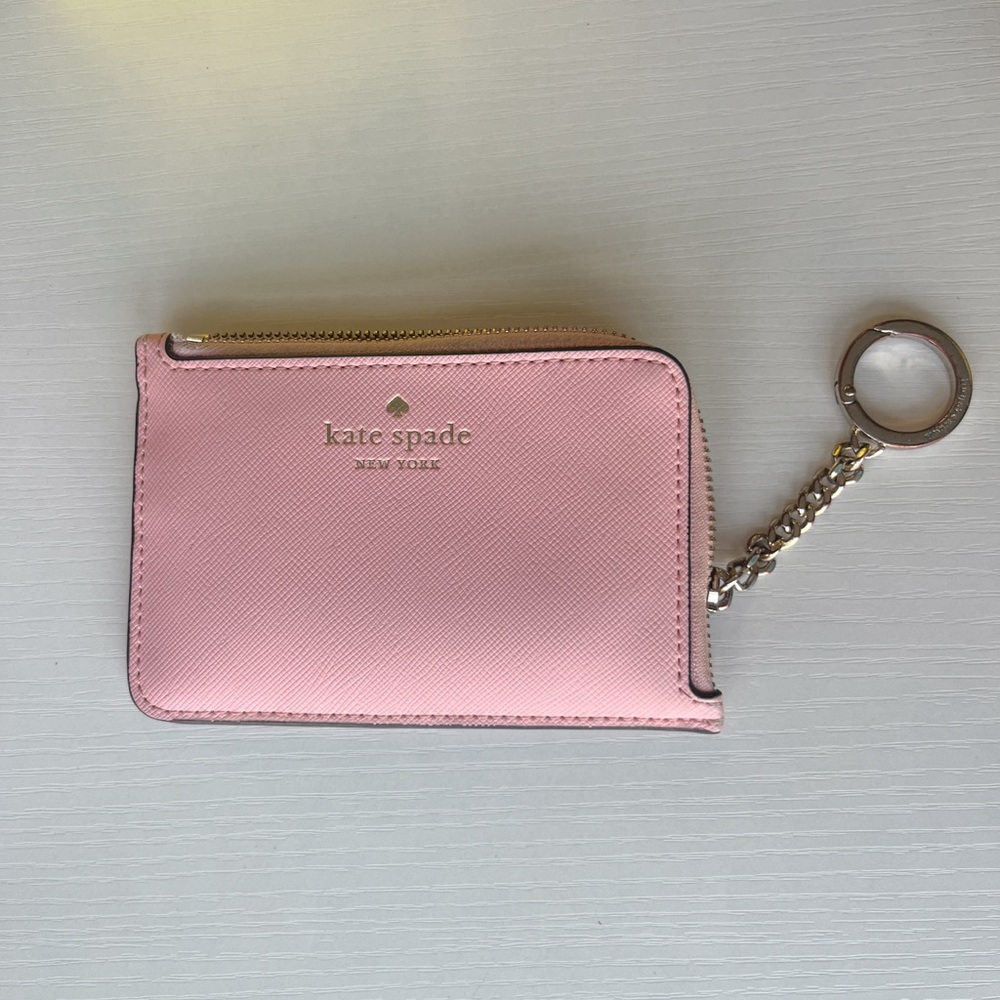 Kate Spade: pink wallet with chain